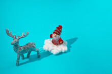 Santa Claus And Reindeer On A Blue Background.Spase For Text.New Year Concept.