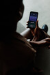 © Oleksii Syrotkin/Stocksy - Person recording podcast