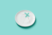 Broken Plate Fixed With Turquoise Tape