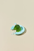 Green Jelly Dessert On Broken Plate