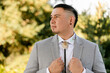 © Leah Flores/Stocksy - A Handsome Groom on His Wedding Day