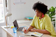 © ALTO IMAGES/Stocksy - Black student doing homework at home