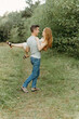 © Luke Liable/Stocksy - Man holding woman