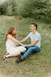© Luke Liable/Stocksy - Couple laughing together on the ground