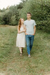 © Luke Liable/Stocksy - Man holding woman while walking