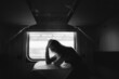 © Ivan Andrianov/Stocksy - Bored Woman In Train
