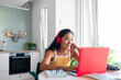 © Studio Firma/Stocksy - Asian Woman Working from Home
