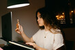 © Eloisa Ramos/Stocksy - Teenager girl using electronics at bedroom