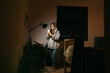 © Eloisa Ramos/Stocksy - Teen female using her phone at night