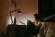 © Eloisa Ramos/Stocksy - Teen woman using her phone at bedrom