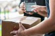 © Sean Locke/Stocksy - Shipment: Woman Signs For Delivery On Tablet