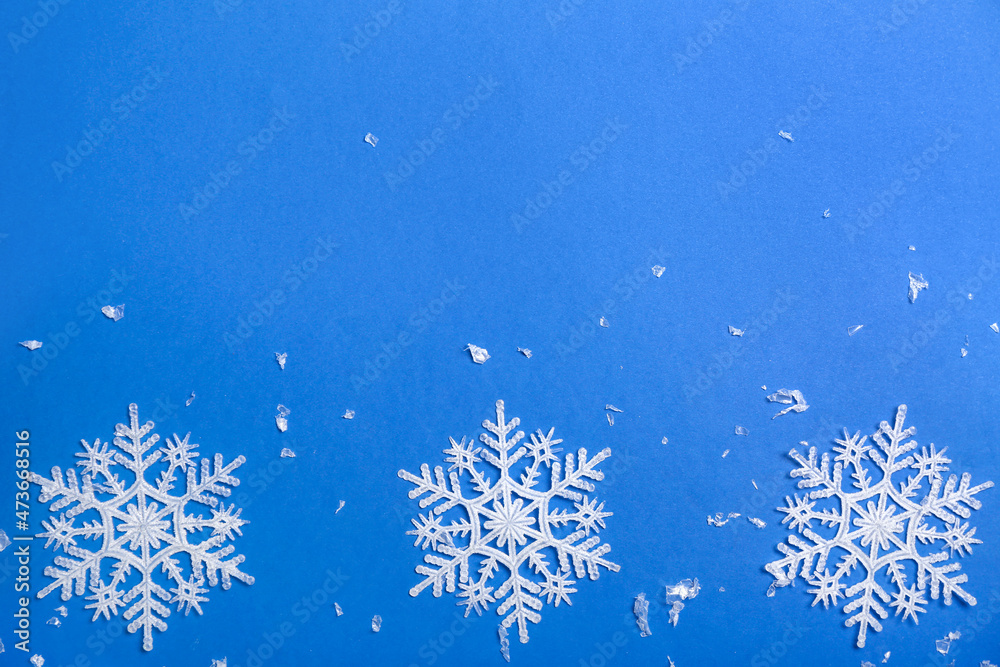 Beautiful snowflakes on blue background