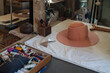 © Tessy Morelli/Stocksy - Hats in progress in the atelier