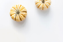 Two Pumpkins On White Background