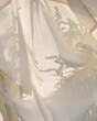 © Haus Klaus/Stocksy - Golden rod shadow on white fabric