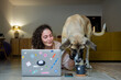 © Eloisa Ramos/Stocksy - Naughty dog ​​with teen girl