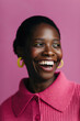 © Sergey Filimonov/Stocksy - Happy black woman portrait seamless background