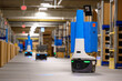 © Raymond Forbes Photography/Stocksy - Multiple Robots at E-commerce Warehouse