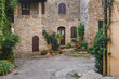 © Giorgio Magini/Stocksy - Exterior of stone building in old town