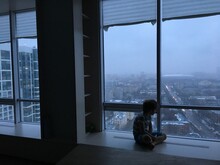A Little Boy At The Window.
