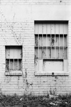 Barred And Boarded Windows