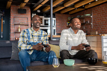 Two Black Man Playing Video Games Indoors