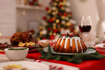 Poster - Festive dinner with delicious cake served on table indoors, space for text. Christmas Eve celebration