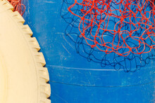 Red Net And Blue Barrel.