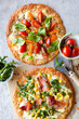 © Nadine Greeff/Stocksy - Gluten-free pizza with  toppings