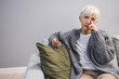 © Dragana Gordic - Pensive thoughtful middle aged lady looking away sit alone at home feel anxious lonely, sad depressed melancholic old mature woman suffer from sorrow grief thinking of problem suffer from solitude