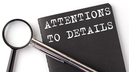 Poster - ATTENTION TO DETAILS - business concept, magnifier with white text message on the black notebook
