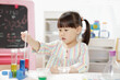 © M-image - young  girl  play science experiments for homeschooling