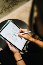Woman Drawing Sketch On Tablet