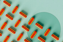 Overhead View Of Hot Dogs On A Blue Background. 3D