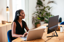 Woman Consulting Via Headset