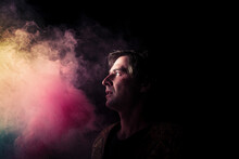 Scared Man Looking At Colour Smoke