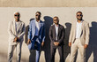 © VICTOR TORRES/Stocksy - Confident businessmen in suit on street