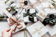 © Melanie DeFazio/Stocksy - Wrapped gift boxes