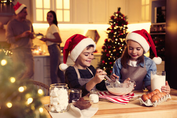 Canvas Print - Cute little children making dough for delicious Christmas cookies at home