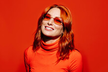 Happy Stylish Woman In Orange Sunglasses