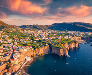 Wall Mural - Adorable evening view from flying drone of Agropoli port. Gorgeous summer seascape of Mediterranean sea. Traveling concept background.