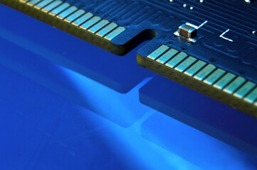 contacts of a microchip of random access memory close-up.