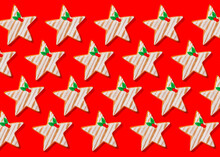 Pattern Of Star Shaped Christmas Cookies Flat Laid Against Vibrant Red Background