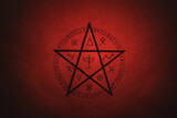 Fototapeta Na ścianę - Pentagram symbol painted on paper with black paint. Occult and esoteric symbols. Spell or black magic ritual. Red color.