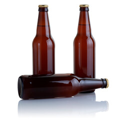 Wall Mural - Three brown glass beer bottles