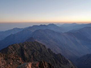  Breathtaking view from the top of Djebel Toubkal, North Africa's highest mountain, at sunrise. Morocco.
