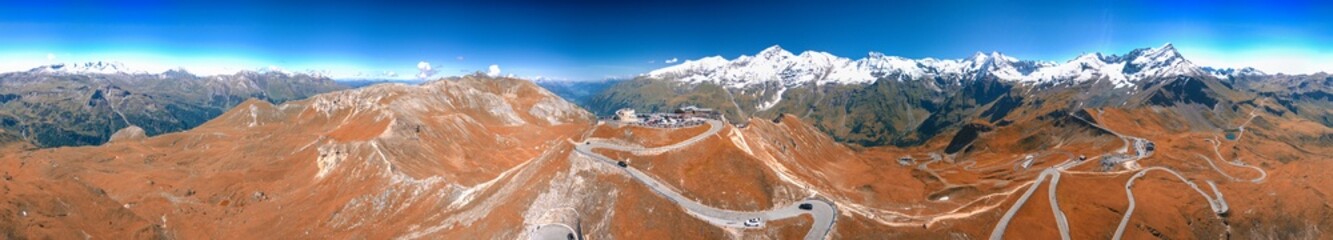 Canvas Print - Panoramic aerial view of Grossglockner alpin peaks in autumn sea