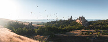 Spain, Castile And Leon, Segovia, Hot Air Balloons Flying Segovia Cathedral And Alcazar Of Segovia