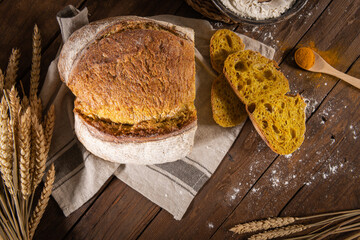 Freshly artisan baked wheat, turmeric and rye bread, country bread. Simple bread for breakfast