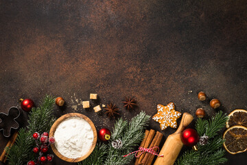 Wall Mural - Christmas baking Ingredients with holiday decorations. Top view with copy space.